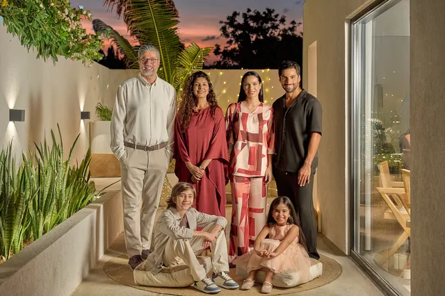 LC Waikiki Ramadan and Eid 2026 campaign photograph: a family gathered on a terrace at dusk.