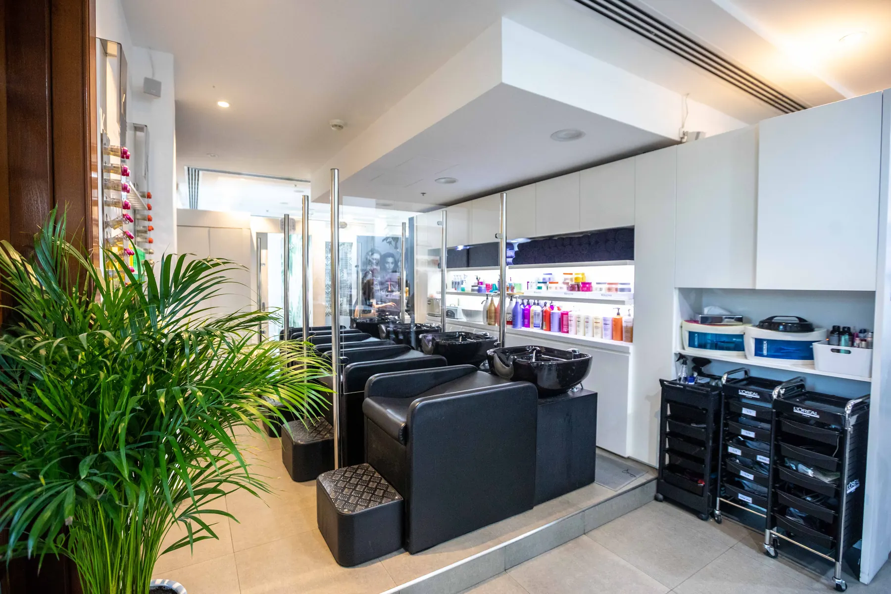The wash stations and styling floor at the Pastels Salon Ritz-Carlton branch.